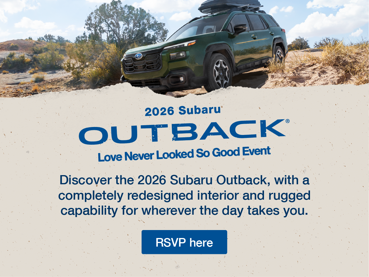 Subaru Outback driving on rugged terrain