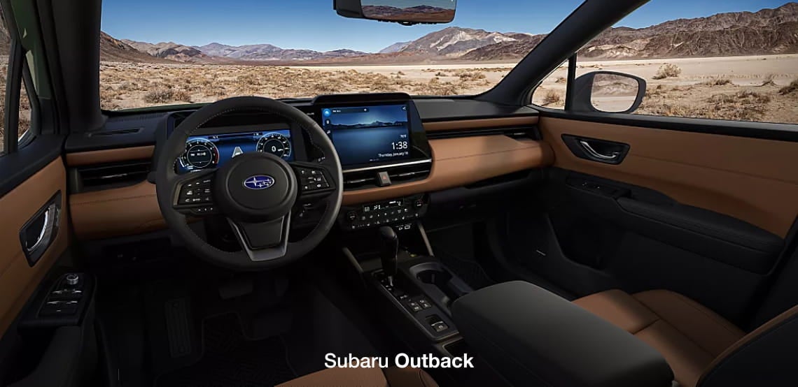 Subaru Outback interior featuring the steering wheel, digital instrument cluster, center touchscreen, and brown seating.