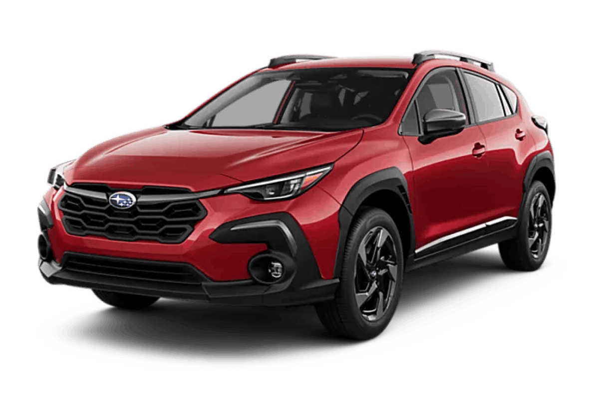 Red Subaru Crosstrek SUV shown from a front three-quarter angle, featuring a black grille, rugged body cladding, roof rails, and black alloy wheels.