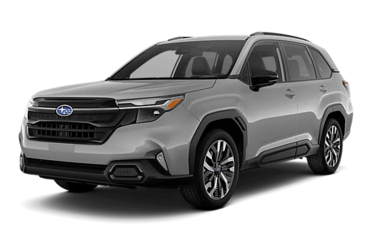 Silver Subaru Forester SUV shown from a front three-quarter angle, featuring a black grille, LED headlights, roof rails, and alloy wheels.